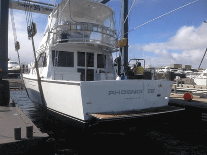 Precision 50 out for annual maintenance and a new teak bowsprit.